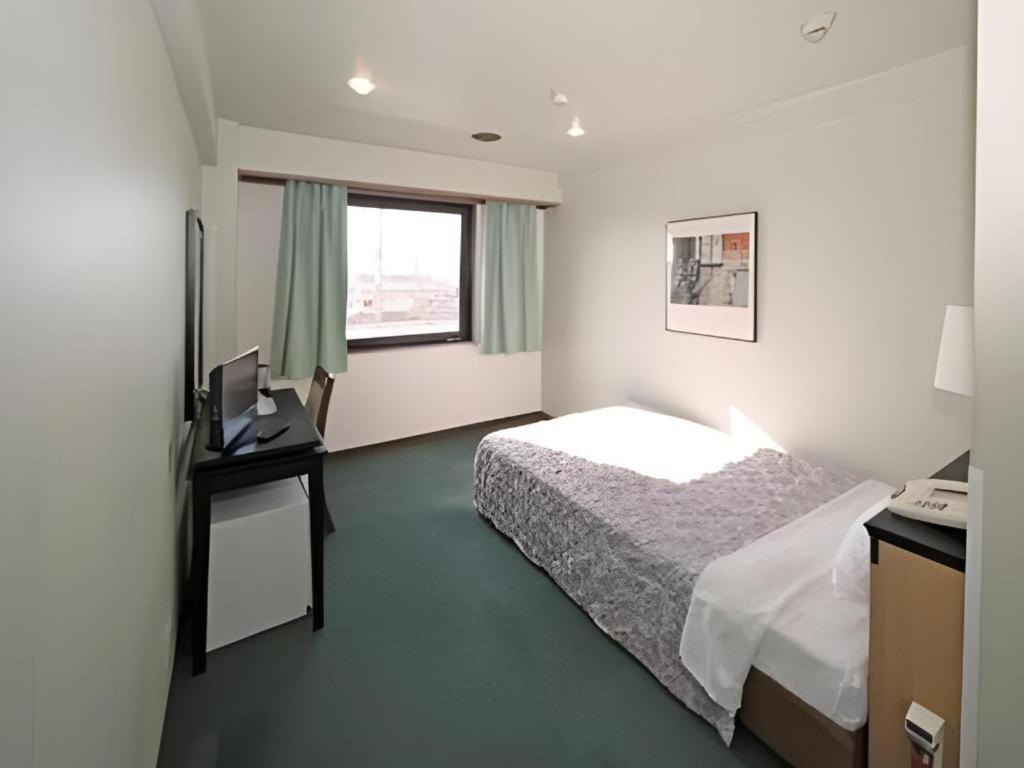 Hotel Yutaka Wing Izumisano Extérieur photo